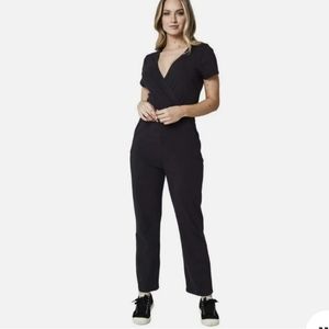 Pact Women's Black Organic Cotton Wrap Jumpsuit size L Pockets Straight leg